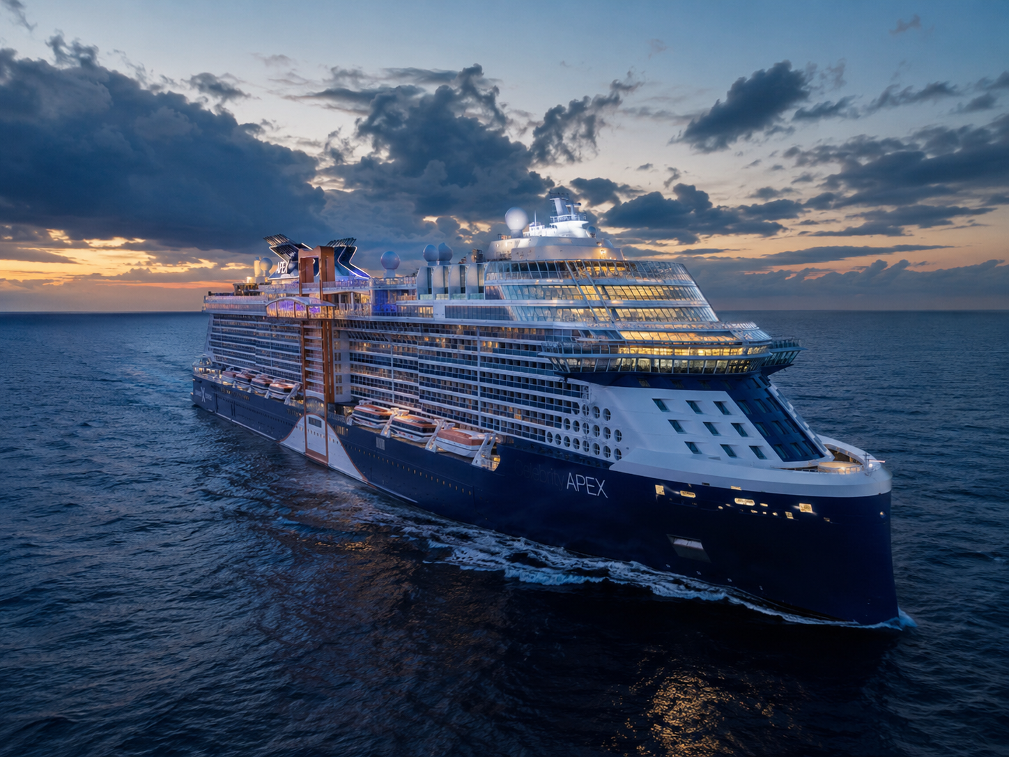 A cruise ship at sea under a darkening sky, far from land