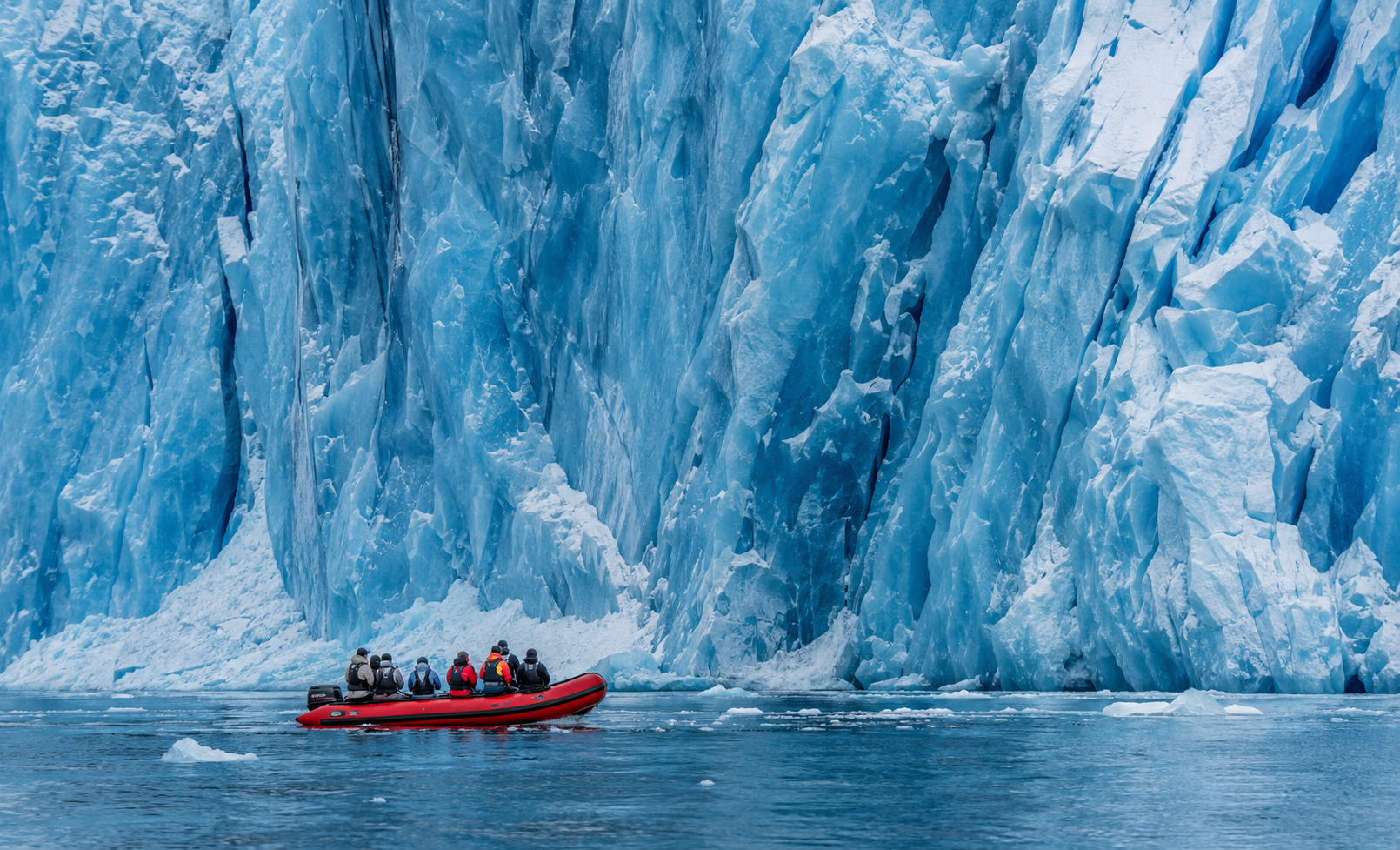 Zodiac expedition boat near glacier